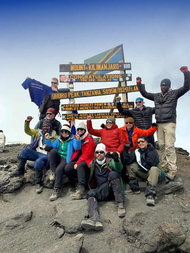 Nature Discovery Guests Summitting Kilimanjaro